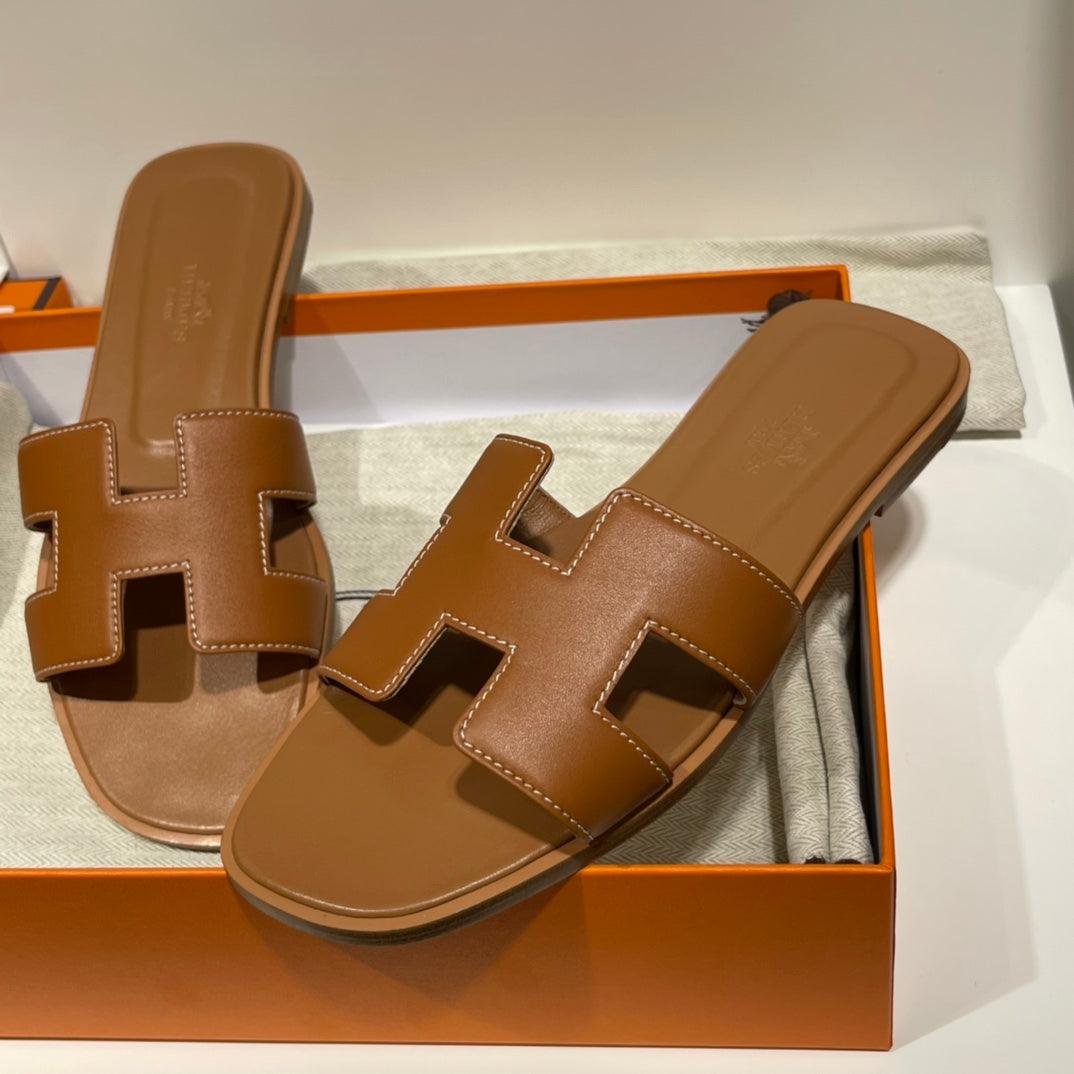 Hermès Oran Sandalet Altın Swift Deri - Glimmer of Luxury