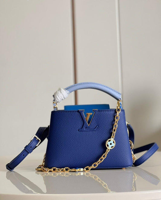 Louis Vuitton Capucines Mini Handbag in Blue